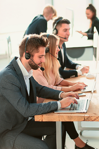 Business agents taking customer calls