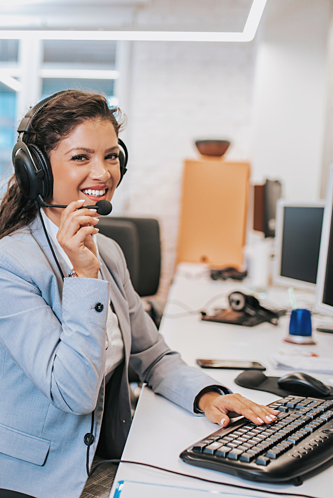 Female IT Support taking client calls
