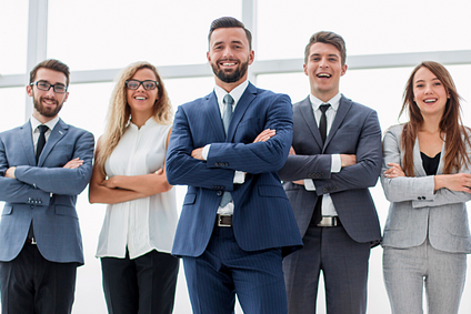 Business partners poses for a photo, doing a crossed arm gesture