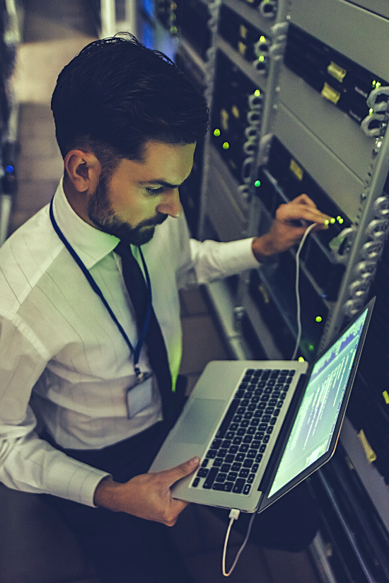 IT Specialist running tests on a server
