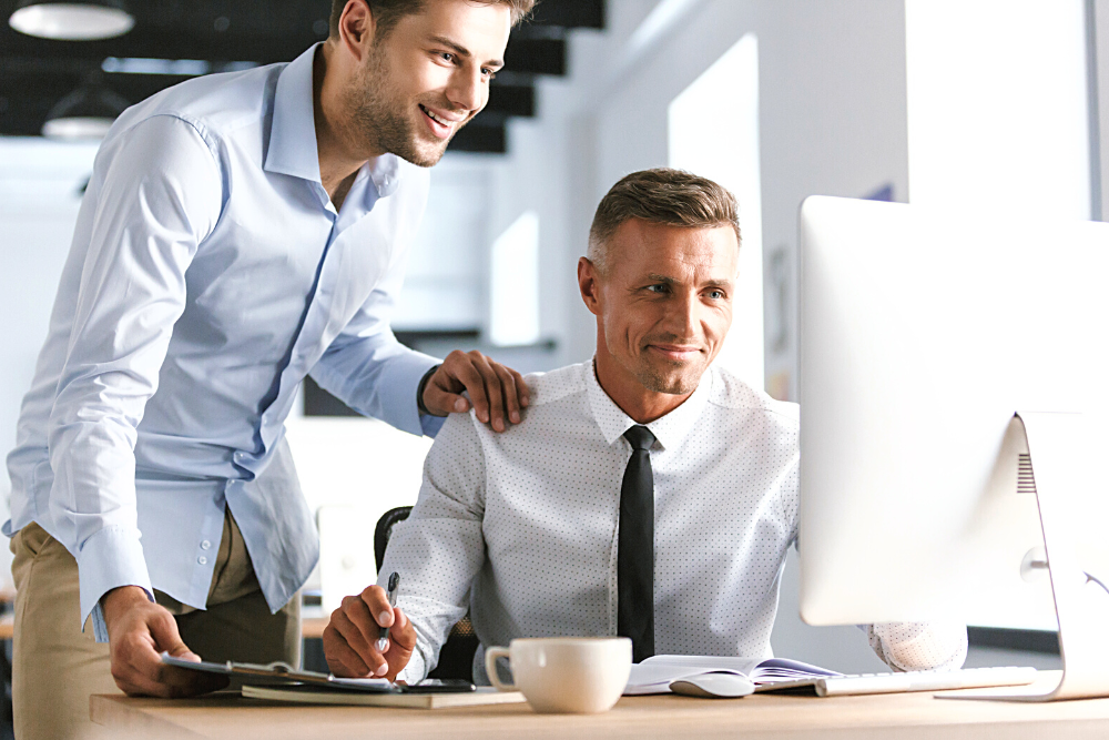 Sydney Managed IT Provides Excellent IT Support Services Businessmen working on a computer