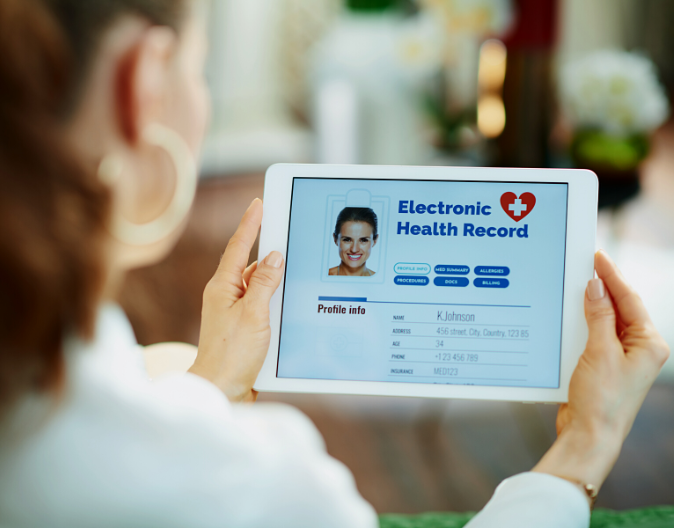Sydney Managed IT Medical IT Specialists Doctor looking at a patient medical record on a tablet